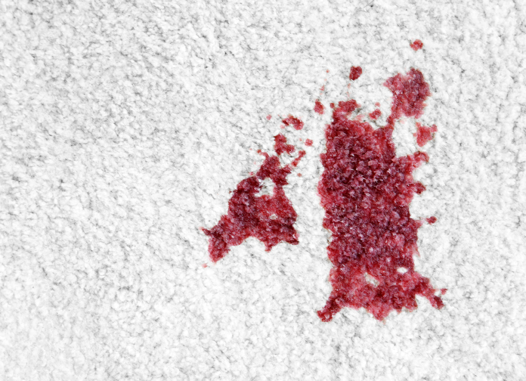 A wine stain on a carpet
